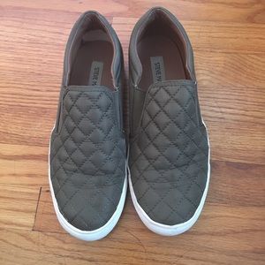green slip ons- steve madden